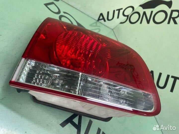 Фонарь крышки багажника левый Volkswagen Touareg