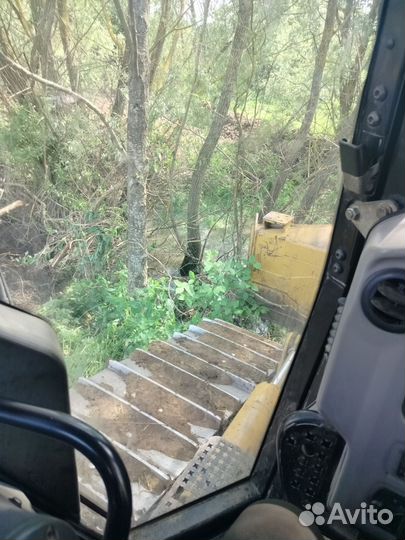 Машинист бульдозера