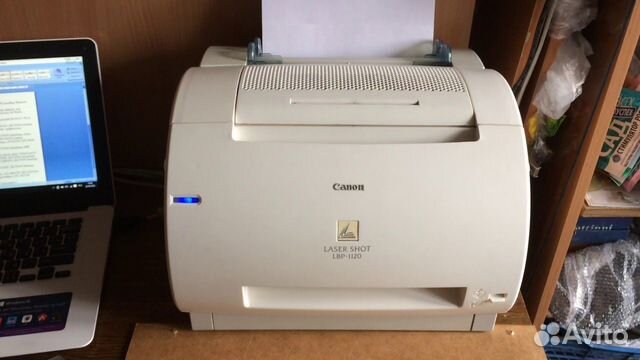 Canon LBP-5000 100/506 Установите ферромагнитный сердечник на кабель lan как пок