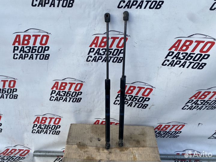 Амортизаторы крышки багажника Opel Astra H купе