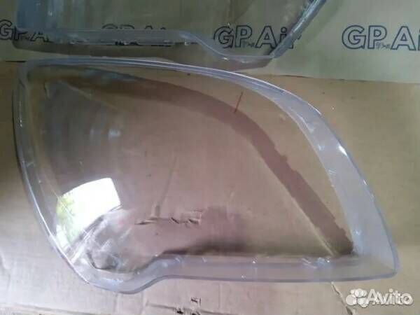 Стекло фары Kia Sportage II Рестайлинг