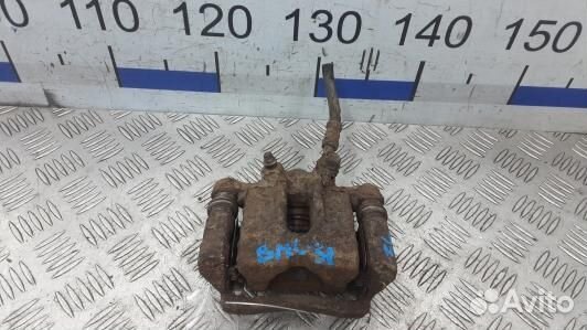 Суппорт тормозной задний левый toyota corolla E12