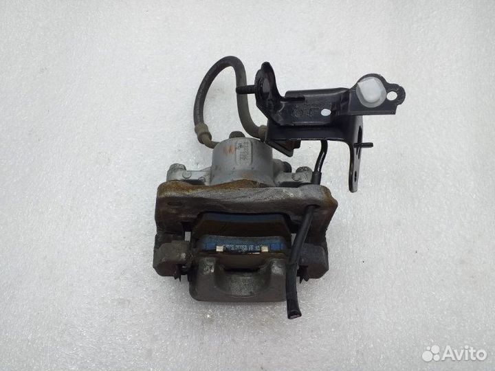 Суппорт тормозной задний левый Toyota Rav4 XA40