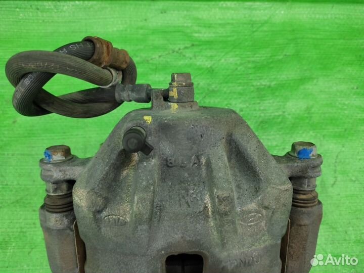 Суппорт передний правый Tucson / Sportage 04-10