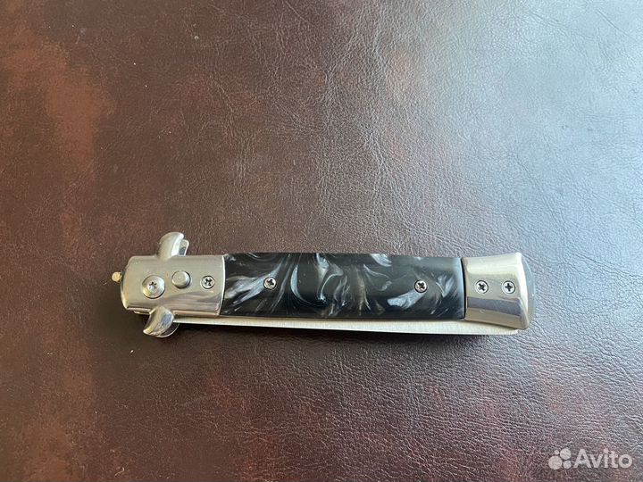 Кнопочная металическая расческа