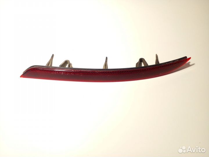 Отражатель в задний бампер левый Opel Astra J