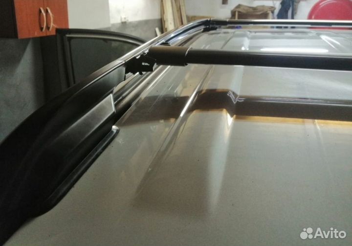 Поперечины на рейлинги RAV4