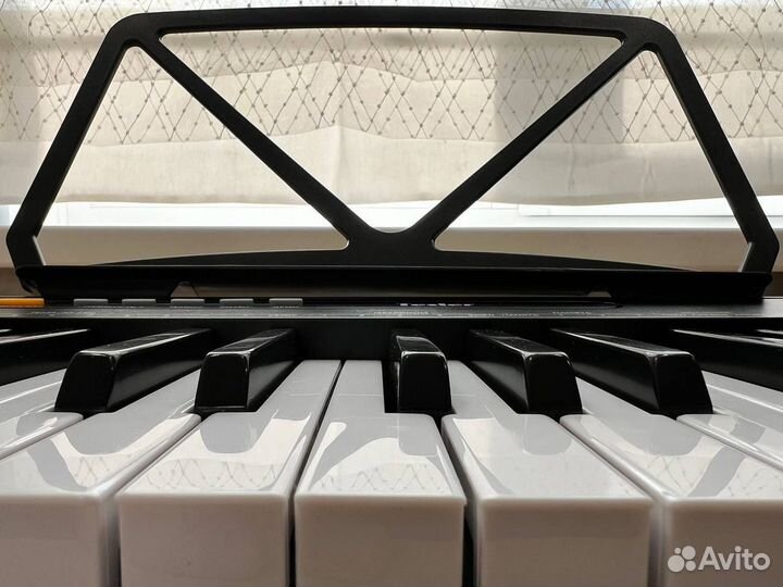 Синтезатор элегантный новый