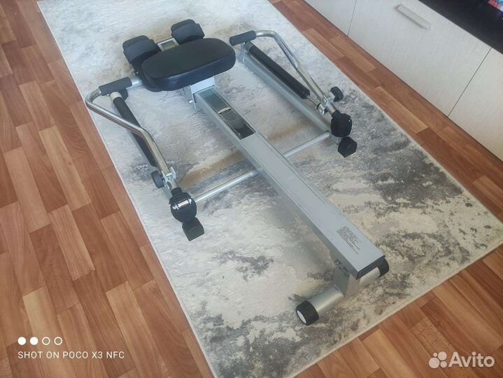 Гребной тренажер