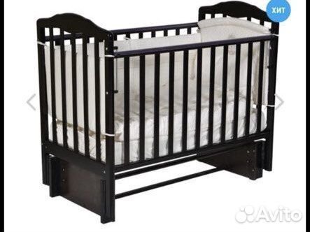 Детская кроватка с универсальным маятником