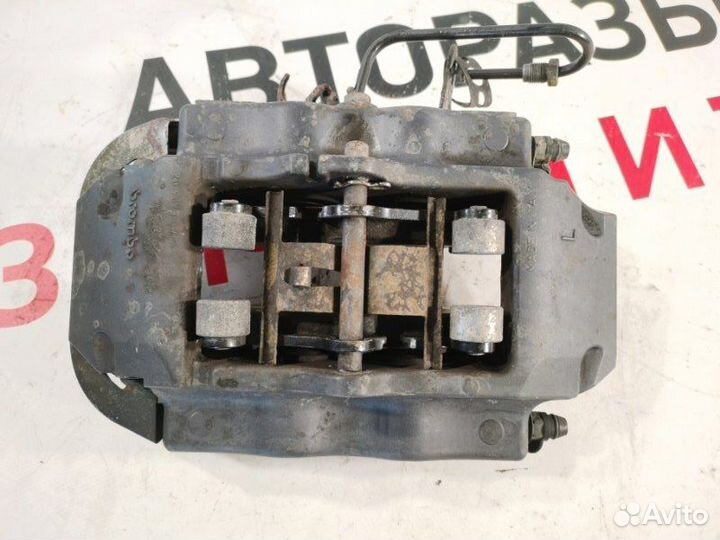 Суппорт тормозной задний левый Audi Q7 внедорожник