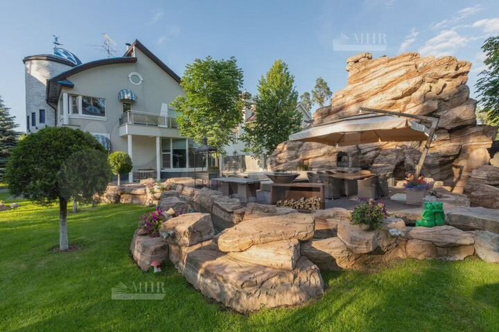 Дом 500 м² на участке 14 сот.