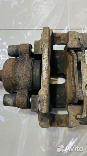 Суппорт задний левый