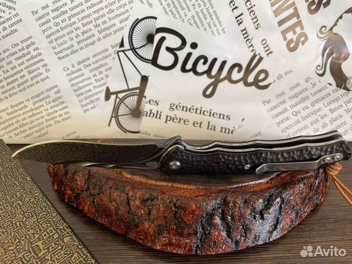 Складной нож из дамасской стали