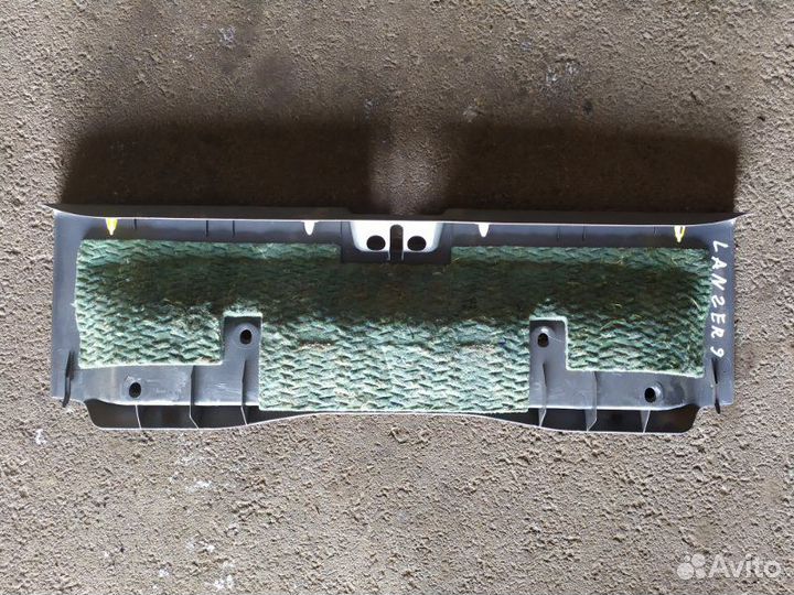 Обшивка багажника на панель Mitsubishi Lancer CS