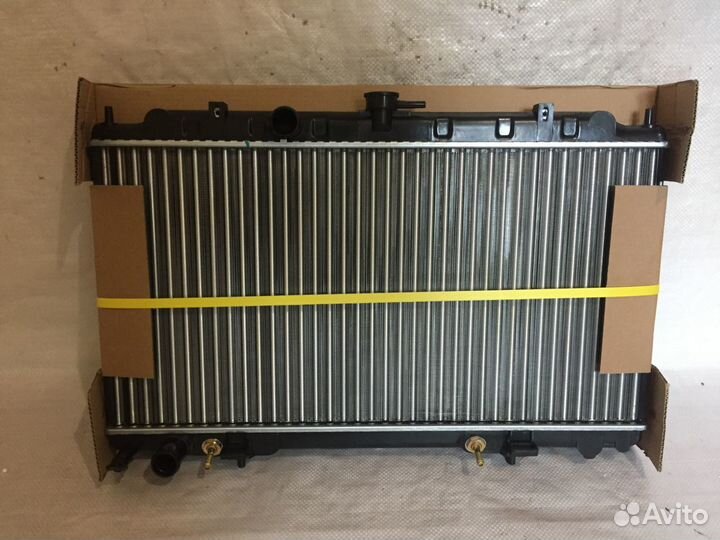 Радиатор основной Ниссан Примера 12