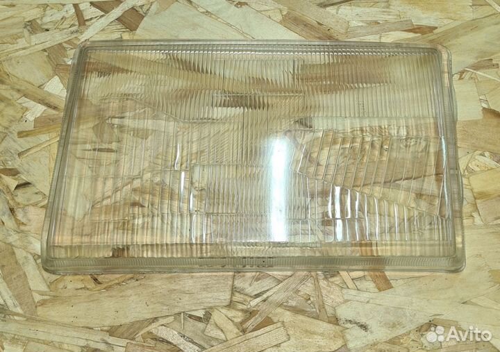 Стекло фары левое Fiat Tipo 88-93
