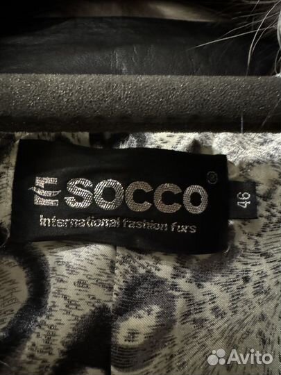 Меховая жилетка