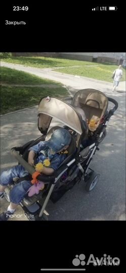 Коляска для двойни погодок