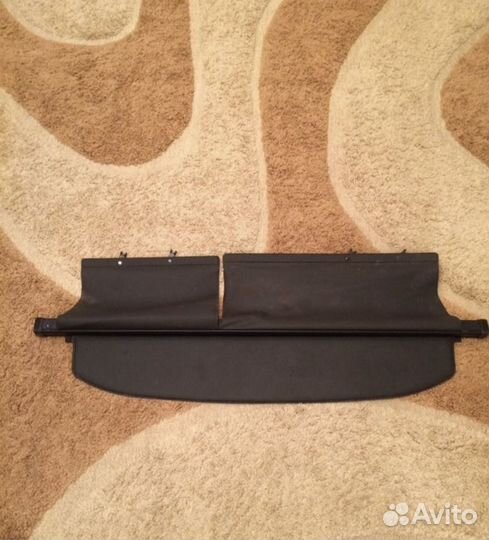 Шторка багажника Fielder nze121