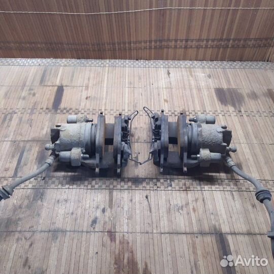 Суппорт тормозной передний Ford Focus 1 седан 2.0