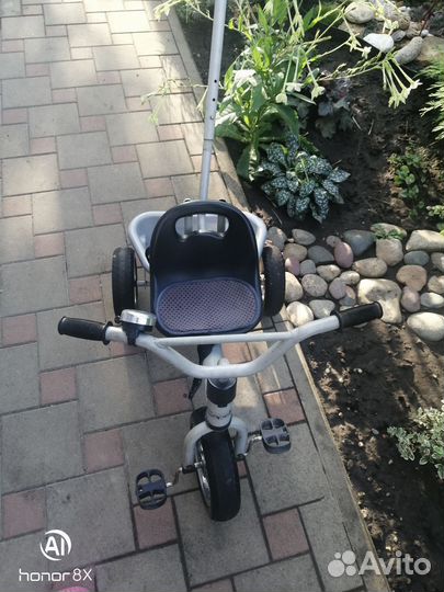 Трехколесный велосипед с ручкой