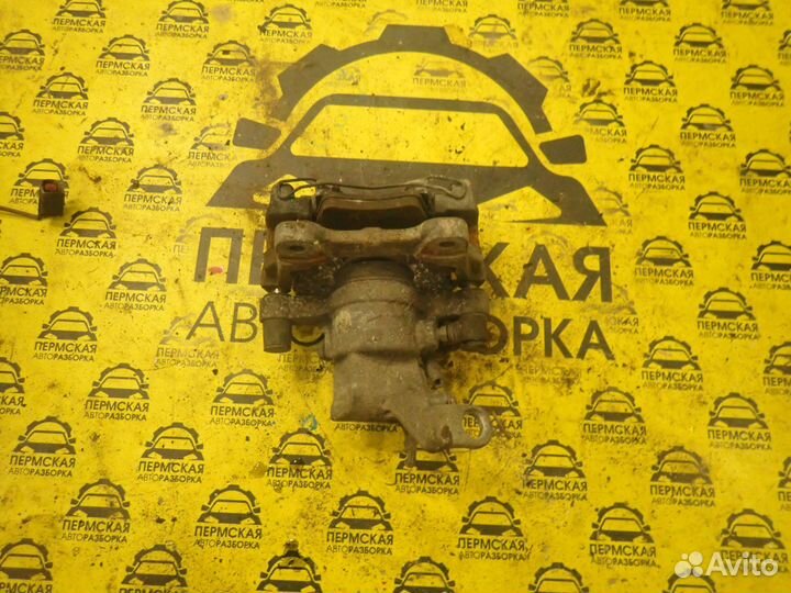 Суппорт тормозной задний левый для Jaguar XJ 2009)