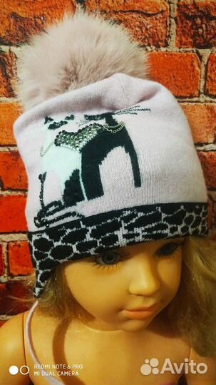 Фирменные,зимние шапочки tavitta