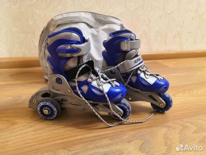 Роликовые коньки