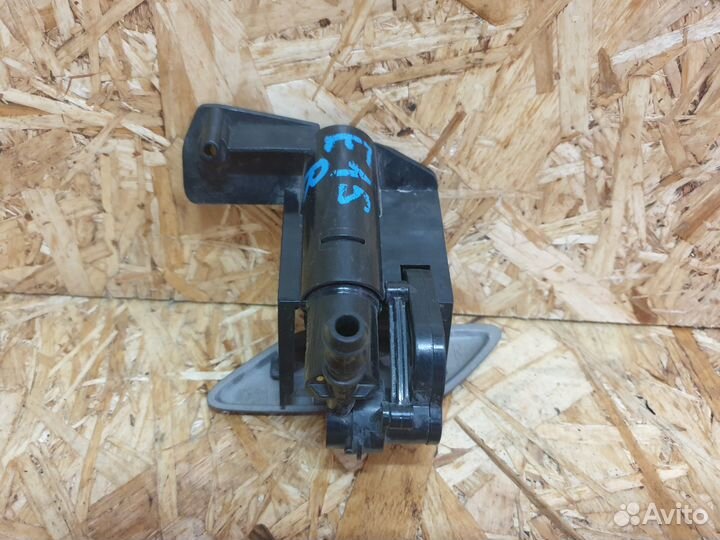 Форсунка омывателя фары Toyota Corolla E15