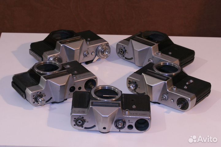 За все 5 фотоаппаратов Зенит Е