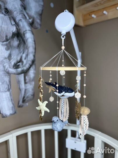Мобиль в кроватку новый