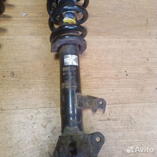 Передние стойки mazda 6 gg