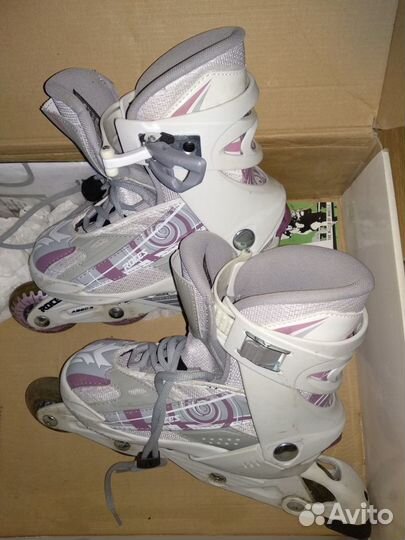 Коньки роликовые