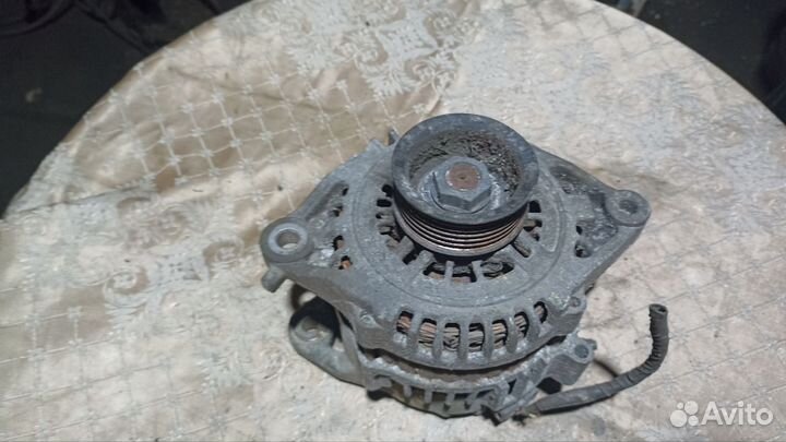 Генератор Nissan Almera N16 Primera на запчасти 23