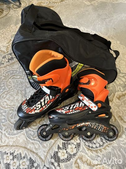 Роликовые коньки