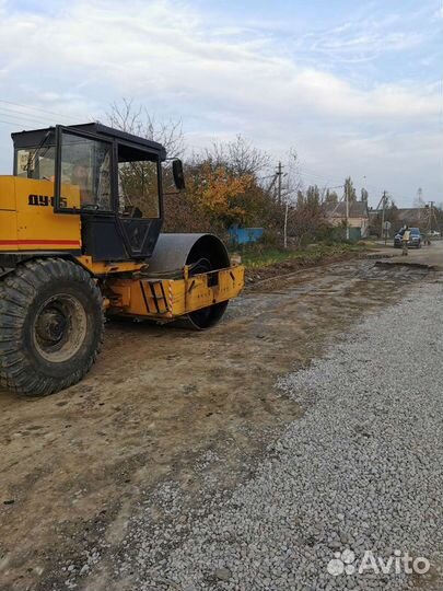 Услуги Экскаватор-погрузчик