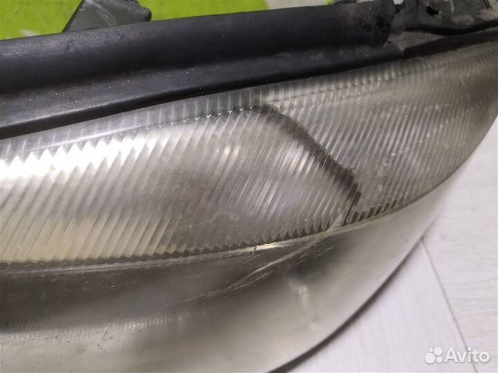 Фара левая Опель Астра Джи 98-05