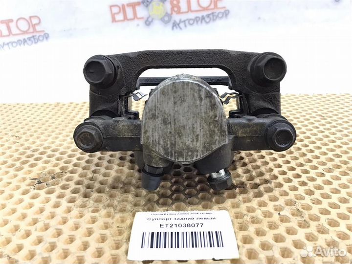 Суппорт задний левый Toyota Estima (AHR20,ACR50,A