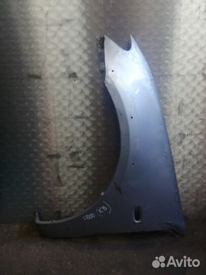 Крыло левое Mitsubishi L200 Митсубиси Л200