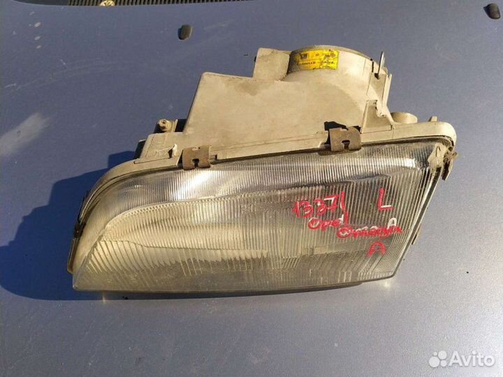 Фара левая Opel Omega A 1990