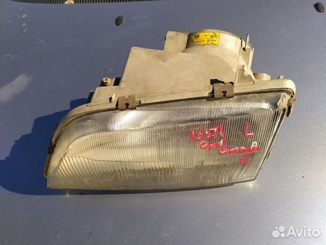 Фара левая Opel Omega A 1990