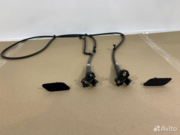 Форсунка омывателя фар передняя левая Lexus Rx