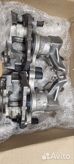 Суппорт передний правый и левый для Opel Astra