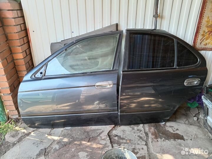 Дверь nissan sanny