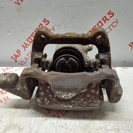 Суппорт тормозной задний правый Volkswagen Touran