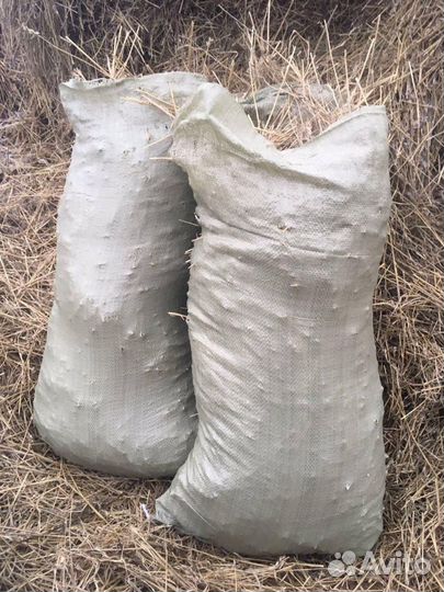 Солома в мешках