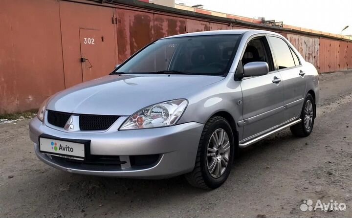 Бампер передний Mitsubishi Lancer 9 цвет silver