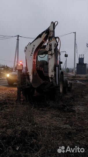 Экскаватор-погрузчик Terex TLB840, 2011