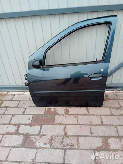 Дверь передняя левая renault logan 1